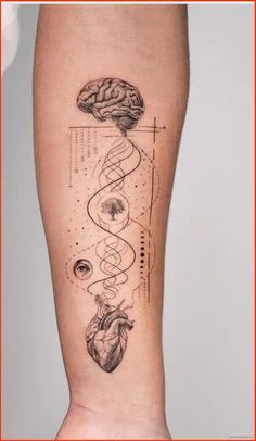 a person with a tattoo on their leg that has an image of a human brain