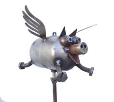 Flying Pig, metal outdoor decor sculpture. Made from reclaimed pieces, no two sculptures exactly alike.THREE SIZE OPTIONS:Mini - 5.5" (comes with both options, hangs or screws to 19" display rod) $50.Medium 19” long, 21.5” wingspan (hang only, comes with bolt on back to hang, hanging wire not included) $150 Big Pig 20” long (hang only, all features are same size as Large size, just has bigger body) $185 Fred Conlon is the creative genius behind Sugarpost Pottery and Metal located in Salt Lake Ci Metal Sculpture Artists, Diy Welding, Metal Tree Wall Art, Metal Yard Art, Metal Welding, Metal Garden Art, Flying Pig, Junk Art, Steel Sculpture