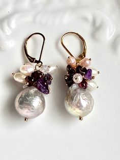 These Edison pearls are another vintage find from an auction. These are gorgeous pearls. Silvery pink and purple nacre.    Garnet chips, amethyst chips, cubic zirconias, pink and white teardrop accent pearls.  You can always ask for a different earring mount. a. lever back.  b. long custom hook  c. short custom hook. Purple Teardrop Pearl Drop Jewelry, Trendy Silver Jewelry, Rice Pearls, Edison Pearls, Amethyst Beads, Bead Earrings, Gorgeous Necklaces, Gorgeous Earrings, Earrings Silver