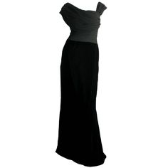 Absolutely remarkable vintage Oscar de la Renta gown! Beautiful black silk velvet skirt, with a pleated asymmetrical chiffon bodice. Slight mermaid train. Hidden hook-and-eyes at top left shoulder (to hold everything in place). Wonderful construction, and a fantastic, comfortable fit! In great condition. Approximately Size Small-Medium Measurements: 36-38 inch bust 28 inch waist 38 inch hips 64 inches from top shoulder to hem Black Pre-draped Evening Dress With Ruched Bodice, Pre-draped Evening Dress With Bias Cut For Formal Events, Formal Pre-draped Evening Dress With Bias Cut, Formal Pre-draped Bias Cut Evening Dress, Pre-draped Bias Cut Formal Evening Dress, Bias Cut Pre-draped Formal Evening Dress, Elegant Silk Evening Dress For Black-tie Events, Silk Fitted Gown For Black-tie Events, Black Pre-draped Evening Dress With Pleated Bodice