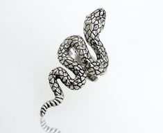 Handcrafted designer adjustable size sterling silver ring with an elegant snake design and textured pattern. Material: .925 Silver Finish Oxidized Unique Sterling Silver Snake Ring, Elegant Handmade Snake Ring, Unique Handmade Snake Ring, Sterling Silver Snake Ring, Snake Rings, Snake Design, Snake Ring, Silver Ring, Sterling Silver Rings