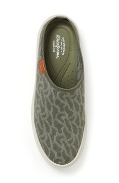 A shock-absorbing rubber sole and arch support ensure comfort in this sneaker with an easy on/off profile for on-the-go styling. Removable, cushioned insole with arch support Textile upper and lining/rubber sole Imported Casual Lightweight Slip-on Sneakers With Slip-resistant, Casual Textile Slip-on Walking Shoes, Casual Green Breathable Slip-on Sneakers, Casual Ergonomic Walking Shoes With Arch Support, Casual Walking Shoes With Arch Support And Ergonomic Fit, Comfortable Casual Sneakers With Ortholite Insole, Casual Comfortable Sneakers With Ortholite Insole, Casual Slip-resistant Walking Shoes, Casual Slip-on Sneakers For Outdoor