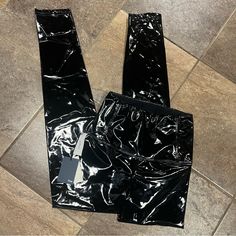 Xs New With Tag Shiny Black Trendy Shiny Black Bottoms, Black Stretch Leather Pants For Night Out, Black Stretch Leather Pants For Streetwear, Aritzia Wilfred Pants, Black Pvc Pants, Latex Black Pants, Brown Flare Pants, Black Non-stretch Faux Leather Pants, Melina Pant