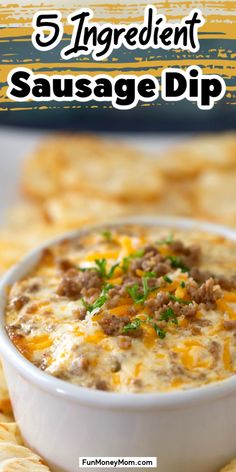 a white bowl filled with cheese dip surrounded by crackers