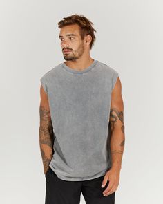 Meet our Oversized Tank! The heavy washed effect on the fabric adds a vintage and worn-in look, making this tank the perfect choice for a casual, effortless style. Crafted from 100% Cotton, this tank is soft, comfortable, and durable. Whether you're lounging at home or running errands, the Oversized Tank is the perfect choice for a relaxed and stylish look. Oversized fit Slightly wider neckline Broad fit across shoulders and chest Dropped sleeve Body is loose and baggy Chain stitch detail around How To Style Tank Tops, Outfit For Guys, Tank Tops Outfit, Mens Fashion Summer Outfits, Hype Clothing, Tank Outfit, Mens Leggings, Street Style Edgy, Tank Top Outfits