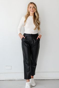 Timeless style is easy to achieve with a classic piece like the Totally Polished Black Leather Pants! These pants seamlessly combine classic style with a touch of rebellion, creating a versatile piece that effortlessly elevates your look. Crafted from high-quality leather, these pants offer a sleek and luxurious feel, ensuring both comfort and an unmistakable sense of chic. The black hue adds a timeless quality, making these leather pants suitable for a range of occasions, from casual outings to Trendy Black High-waisted Leather Pants, Chic Non-stretch Leather Pants For Winter, Chic Non-stretch Leather Pants, Elegant Black Ankle-length Leather Pants, Fitted Ankle-length Leather Pants, Leather Pants Outfit, Black Leather Pants, Casual Tee, Straight Pants