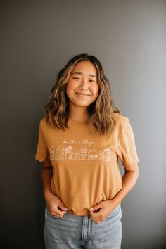 BE THE VILLAGE T-SHIRT - TAN – Goods and Better Neutral Tshirt Women, Tshirt Fundraiser, Throwing Clothes, Crunchy Moms, It Takes A Village, Takes A Village, Cream Design, Foster Mom, Brown Tshirt