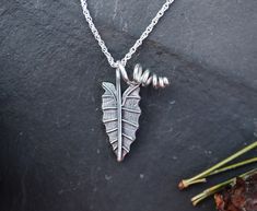 In case you have a hard time deciding on if you would rather the tiny alocasia necklace or earrings, here is a fix for that! This is a set of earrings and a necklace made especially for you! Every one of these leaves is cut out by hand and patterned using a *real* leaf pressure pressed into the recycled sterling silver. The leaves are not flat, but instead a bit bowed and twisted towards the sun just as they are in your sunroom. They all have thick twirly silver stems as well. Because I do this Houseplant Leaves, Leaf Necklaces, Rhaphidophora Tetrasperma, Monstera Adansonii, Real Leaf, Tiny Plants, Real Leaves, Women's Rings, Monstera Deliciosa