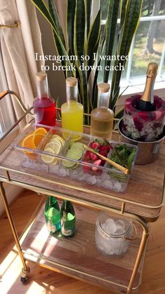 a bar cart filled with drinks and condiments