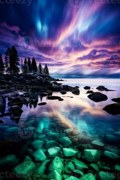 A mesmerizing display of shimmering green and purple hues dancing across the Nordic sky at night Northern Lights Phone Wallpaper, Northern Lights Wallpaper Desktop, Desktop Wallpaper Northern Lights, Blue And Purple Sunset, Northern Lights Over Ocean, Sky At Night, Night Night, Purple Hues