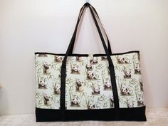 "This Mahjong tote bag is fully lined and allows you to travel to your next Mahj game easily and in style. The bag has a button and loop closure plus four magnetic snaps on the top edge of the lining to secure all of your belongings. It also features long, sturdy shoulder straps for convenient carrying. It is light weight as it is made from cotton fabric and firm interfacing. Four tile racks with the pushers fit perfectly into the bag along with your tile storage bag, zipper organizer/pouch, and Rectangular Bag With Snap Closure As Gift, Rectangular Bags With Snap Closure For Daily Use, Rectangular Canvas Bag With Snap Closure, Travel Canvas Tote Bag With Snap Closure, Travel Rectangular Bag With Snap Closure, Rectangular Travel Bag With Snap Closure, Reversible Rectangular Canvas Travel Bag, Mahjong Tile, Plus Fours