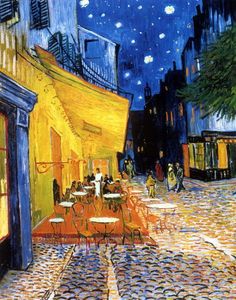 a cross stitch picture of an outdoor cafe at night