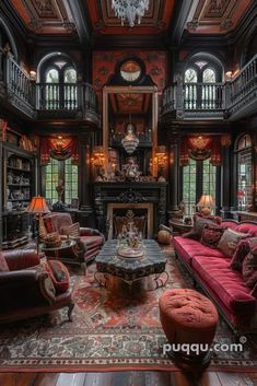 an ornate living room with red couches and chandelier