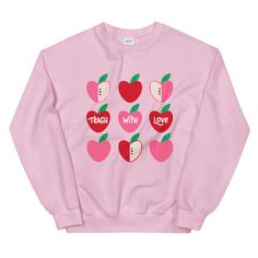 This Valentine's day teacher sweater is the perfect for sweater weather and to show your class you care. If you're looking for a Valentines day shirt ideas for teachers this year look no further. This Teach With Love Valentine's Day tee for teachers is your shirt. Valentine's Day Shirt is a special day for students, why not wear our limited edition sweater too?|| DESCRIPTIONMaterials✨100% cotton✨ Pre-shrunk✨ Classic fit✨ 1x1 athletic rib knit collar with spandex✨ Air-jet spun yarn with a soft fe Pink Teacher Shirt, Valentines Day Shirt Ideas, Teaching Fits, Teacher Apparel, Womens Valentine Shirts, Teacher Sweater, Teacher Fits, Teacher Accessories, Teacher Fashion