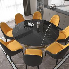 a black table with yellow chairs around it