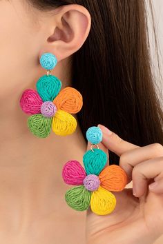 Expertly crafted and effortlessly stylish, our Woven Raffia Drop Earrings feature a large multi-colored flower design that adds a pop of color to any outfit. With a post back closure and measuring at a size of 2.25" x 3.5", these earrings are comfortable and versatile for all-day wear. Elevate your look with these unique and fashionable earrings. Lead & Nickel Compliant Photo may have been enlarged and/or enhanced. Diy Thread Earrings, Navratri Jewellery, Shell Accessories, Textile Earrings, Earrings Diy Handmade, Diy Fabric Jewellery, Bridal Necklace Designs, Fabric Jewellery, Flower Drop Earrings