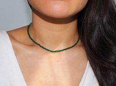 Beautiful choker featuring a green jade gemstones. Jade has many meanings, including strength, luck, and good health. Jade is also revered for its healing properties balancing the body's processes. Details: Choker Necklace measure 14" plus 2" extender chain Gold filled or sterling silver findings (Tarnish resistant and hypoallergenic) 3mm green Jade beads Affordable Jade Gemstone Bead Necklaces, Adjustable May Birthstone Jewelry For Meditation, Adjustable Green Crystal Necklace, Adjustable Green Crystal Necklaces For Meditation, Adjustable Green Choker Necklace, Green Crystal Necklaces For May Birthstone, Green Necklace For Meditation - May Birthstone, Adjustable Green Beaded Necklaces For Meditation, Green Gemstone Beads Jewelry For Meditation