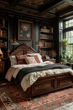 a bed sitting in a bedroom next to a window with lots of books on it