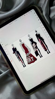 the tablet is displaying an image of women's clothing on it, and there are no images to describe