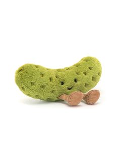 a stuffed toy cucumber laying on its side