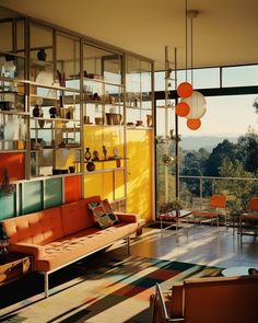 a living room filled with furniture next to a window covered in lots of glass doors