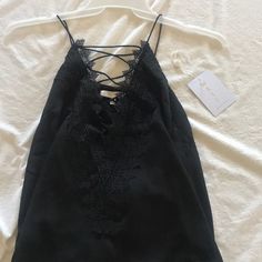 Brand New! Took The Tags Off, Tried It On, And It Was Too Small. Looks Super Cute With A Moto Jacket Or Duster Cardigan. Size Xs Smoke Free, Pet Free Wayf From Nordstrom’s Sleeveless Tops For Fall Going Out, Black Tops For Going Out In Spring, Fall Black Cami Top, Black Cami Top For Spring, Black Cami Top For Fall, Chic Black Tops With Lace Trim, Black Lace Trim Top For Night Out, Black Lace Trim Top For Date Night, Black Wrap Top