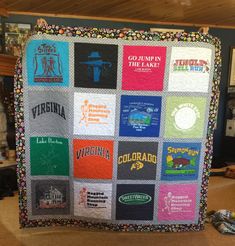 a quilt made to look like it has many different t - shirts on the front