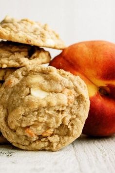 cookies and an apple are stacked on top of each other