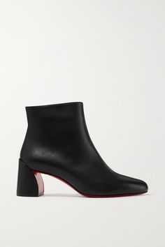 Christian Louboutin's versatile 'Turela' ankle boots are designed with a sculptural block heel that adds a modern feel to the otherwise minimal design. They've been made in Italy from supple black leather and have a rounded toe and the signature red lacquered sole. Wear yours with tailoring, cropped jeans or flowy dresses.  Shown here with: [Loro Piana Turtleneck sweater id1152338], [Loewe Pants id1180600], [Loewe Blazer id1180589], [Khaite Tote id1189297], [Laura Lombardi Ring id1177327], [Kenn Christian Louboutin Boots, Laura Lombardi, Flowy Dresses, Shoes Boots Ankle, Christian Louboutin Women, Loro Piana, Iconic Women, Louboutin Shoes, Black Ankle Boots