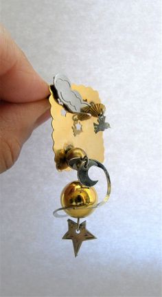 "A fantastic artsy Futuristic kinetic art pin with themes of Earth, Moon Galaxy in gold and silver metal. The gold ball is suspended on soldered wire with a silver ring and moon dangling around it. There is a cloud and bird with cut out stars. Very special and unique artisan pin. In great vintage condition. Measures 2 3/4\" long x 1 1/2\" wide x 3/4\" depth. Very Treky I will ship this item within one business day of receiving payment. Thank you. Enjoy For more Vintage Jewelry see my listings he Handmade Artistic Gold Brooch, Modernist Gold Brooches For Gifts, Moon Galaxy, Arm Bracelets Upper, Gold Galaxy, Fat Art, Mixed Media Jewelry, Vintage Housewares, Kinetic Art