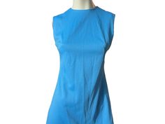 "Vintage 70's blue polyester sleeveless dress, looks to be handmade, zips up the back, in good vintage condition, measurements are bust up to 36\" waist up to 30\" hips up to 36\" length 37.5\"" Retro Stretch Sleeveless Mini Dress, Light Blue Sleeveless Vintage Dress, Blue Fitted Mini Dress With Side Zipper, Light Blue Fitted Sleeveless Midi Dress, Blue Summer Mini Dress With Back Zipper, Blue Stretch Mini Dress With Back Zipper, Blue Mini Dress With Back Zipper For Summer, Blue Knee-length Mini Dress With Back Zipper, Blue Sleeveless Dress With Side Zipper