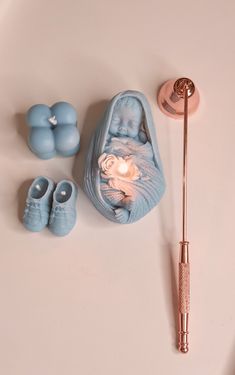 a baby's crib and its accessories on a table