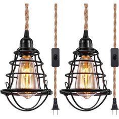 two industrial style lights hanging from rope