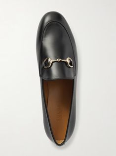 GUCCI Jordaan horsebit-detailed leather loafers | NET-A-PORTER Horsebit Detail Slip-on Loafers For Work, Gucci Luxury Loafers With Leather Lining, Gucci Luxury Calf Leather Loafers, Luxury Gucci Calf Leather Loafers, Gucci Loafers In Calf Leather, Gucci Calf Leather Loafers With Branded Insole, Gucci Calf Leather Loafers, Designer Gucci Loafers With Leather Lining, Chic Formal Loafers With Horsebit Detail