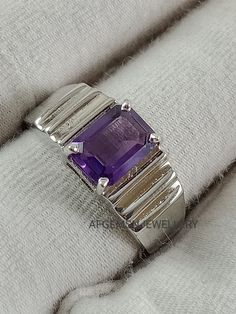 "Gemstone Name = Natural Amethyst Gemstone Color = Purple Gemstone Size = 6X8 mm Gemstone Shape = Rectangle Cut Quality :- AAA Brand Name = AFGEMSNJEWELLRY Metal:- 925 Sterling Silver Stone Treatment:- Natural STATEMENT RING FOR ALL OCCASION These silver RING make a gorgeous gift for a loved one - for mom, sister, girlfriend, wife or friend - for any occasion such as a birthday, a graduation, an anniversary, Christmas, or Valentines' Day gift. Ideal for those who like their style to be simple, e Amethyst Jewelry Ring, Gemstone Rings Vintage, Amethyst Gem, Purple Band, February Birth Stone, Gorgeous Gift, Amethyst Gemstone, Amethyst Ring, 925 Silver Rings