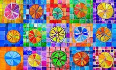 an art project made out of colored paper with different slices of fruit and vegetables on it