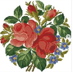 a cross stitch pattern with red roses and blue flowers on the bottom half of it