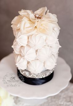 three different cakes with flowers on top of each one and the same cake as shown in pictures