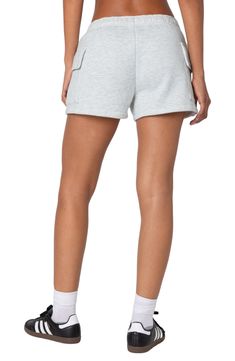 Soft cotton fleece adds cozy comfort to these relaxed shorts popped with on-trend cargo pockets for an ultracool look. Elastic waist Cargo flap-patch pockets 100% cotton Machine wash, dry flat Imported Sporty Short Bottoms With Cargo Pockets, Sporty Short Length Bottoms With Cargo Pockets, Athleisure Shorts With Cargo Pockets, Sporty Cotton Shorts With Multiple Pockets, Sporty Cargo Shorts With Side Pockets, Sporty Shorts With Multiple Pockets, Athleisure Cargo Shorts, Sporty Cotton Cargo Shorts With Built-in Shorts, Cotton Athleisure Bottoms With Multiple Pockets