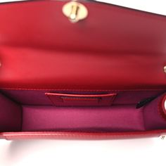 This is an authentic BULGARI Calfskin Serpenti Forever Crossbody Bag in Ruby Red. This stylish bag is crafted of dark red calfskin leather and embellished with a multicolored snake head at the snap. The bag features gold hardware including the snake scale stylized chain strap. The front snap opens to a red fabric interior with a patch pocket. Pop Stitch, Snake Head, Micro Bag, The Snake, Small Shoulder Bag, Red Fabric, Stylish Bag, Black Cross Body Bag, Ruby Red