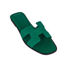 Guaranteed authentic Hermes Oran Emerald sandals.This stunning limited edition Hermes Oran flat slide sandal is featured in Epsom leather.The iconic H cutout over the top of the foot.Emerald embossed calfskin insole. Wood heel with leather sole. Comes with sleepers, signature Hermes box and ribbon. NEW or NEVER WORN.Please see our extensive collection of Hermes Oran sandals available.final saleSIZE 37 USA SIZE 7 SHOE MEASURES:HEEL .5"UPPER SOLE 7.5"CONDITION: NEW or NEVER WORN Green Leather-sole Flats For Summer, Green Leather Sole Flats For Summer, Green Flat Sandals With Leather Sole, Luxury Summer Flats With Round Toe, Luxury Round Toe Flats For Summer, Luxury Summer Slides With Rubber Sole, Green Open Toe Mules With Leather Sole, Elegant Green Flats For Summer, Luxury Green Sandals With Single Toe Strap