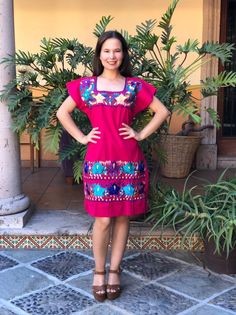 "Beautiful Mexican dress embroidered with bright colors by artisans from Oaxaca. This dress has straps to adjust at the back. Each dress has a unique embroidery so the colors may vary. Mexican textile art has centuries of history and creativity throughout the country. Mexico is recognized as one of the leading countries with a beautiful aristic production in the textile world, miraculous hands of talented artisans from different states of the country create stunning embroidery clothing, and vari Cinco De Mayo Fiesta Dress With Multicolor Embroidery, Traditional Dress For Fiesta And Cinco De Mayo, Short Sleeve Embroidered Dress For Cinco De Mayo Fiesta, Short Sleeve Dresses For Cinco De Mayo Fiesta, Traditional Pink Dress For Fiesta, Bohemian Embroidered Dress For Day Of The Dead, Pink Bohemian Dress For Fiesta, Red Dress For Cinco De Mayo Fiesta, Mexican Huipil