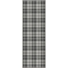 a black and white plaid rug on a white background