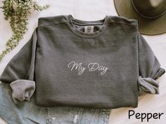 Hello, My Day friends!🍀 As a huge fan of DAY6 myself, I poured my heart into creating this special "My Day🍀" Sweatshirt just for us! Whether you're blasting their music on repeat or quietly cherishing their lyrics, this tee is a way to carry that love with you wherever you go. 🐱Soft & Cozy: Made from the comfiest, softest fabric, this T-shirt is perfect for those long listening sessions or even your next DAY6 concert (fingers crossed!). 🐰Thoughtfully Designed: The design is simple yet meanin Korean Bands, Crossed Fingers, On Repeat, Oversized Sweatshirt, K Pop, Unisex Sweatshirt, Soft Fabrics, Sweat Shirt, Perfect Fit