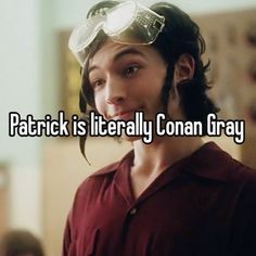 a man with glasses on his head and the words patrick is literally coran gray