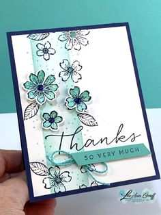 a hand holding up a card with flowers on it and the words thanks so very much