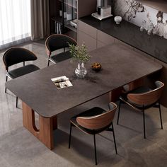 a dining room table with chairs around it