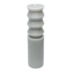 a white ceramic candle holder on a white background