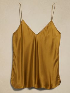 An indulgent, elegant essential, this versatile camisole is crafted from our washable silk charmeuse and cut on the bias for figure-flattering drape.  SEMI-FITTED: Cut for a not-too-tight, not-too-loose fit.  V-neck.  Adjustable slider straps.  Dolph Dried Yarrow, Happy Boxing Day, Silk Camisole, Silk Charmeuse, Petite Size, Hip Length, Banana Republic, Camisole Top, Loose Fitting