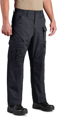 PRICES MAY VARY. READY FOR DUTY: Designed with the job in mind, our Uniform Tactical Pant has all the premium, multifunctional features at an affordable price, so can you report to duty with a classic and professional look CARRY IT ALL: Extra large belt loops are designed for a nylon duty belt. There are 2 back pockets with hook and loop closure, 2 front pockets with reinforced opening for folding knife or tool clip, and 2 double cargo pockets with open-top slash pockets COMFORT + PERFORMANCE: M Men's Uniform, Duty Belt, Large Belt, Safety Clothing, Tactical Pants, Knee Pads, Folding Knife, Professional Look, Open Top